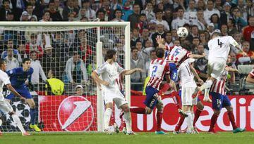 Ramos (right) scores his memorable last-gasp equaliser against Atlético Madrid on this day in 2014.