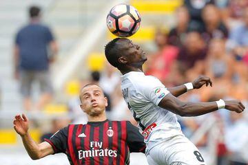 Antonelli challenges Udinese's Emmanuel Agyeman earlier in the match