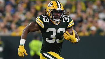 Packers' RB was emotional after an amulet of tremendous sentimental value was found on the eve of his record-breaking game