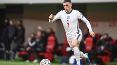 (FILES) In this file photo taken on March 28, 2021 England&#039;s midfielder Phil Foden runs with the ball during the FIFA World Cup Qatar 2022 qualification Group I football match between Albania and England at the Arena Kombetare (Air Albania Stadium), 
