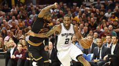Jan 21, 2017; Cleveland, OH, USA; San Antonio Spurs forward Kawhi Leonard (2) drives to the basket against Cleveland Cavaliers guard Kyrie Irving (2) during the second half at Quicken Loans Arena. The Spurs won 118-115. Mandatory Credit: Ken Blaze-USA TOD