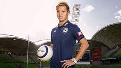 Former Japan international Keisuke Honda poses for a photograph wearing a Melbourne Victory shirt after a media conference in Melbourne, Australia August 15, 2018.  AAP/Daniel Pockett/via REUTERS    ATTENTION EDITORS - THIS IMAGE WAS PROVIDED BY A THIRD P