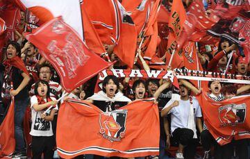 Urawa Reds' supporters cheer for their team during the Asian Champions League final football match between Japan's Urawa Reds and Saudi Arabia's Al-Hilal on November 18, 2017, at King Fahd Stadium in the capital Riyadh. /