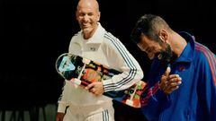 Zinedine Zidane con una tabla de skate con Lucas Puig, skater, con ch&aacute;ndales de Adidas Y3. 