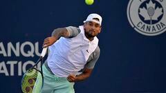 Aug 11, 2022; Montreal, QC, Canada; Nick Kyrgios (AUS) serves against Alex De Minaur (AUS) (not pictured) in third round play in the National Bank Open at IGA Stadium. Mandatory Credit: Eric Bolte-USA TODAY Sports