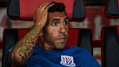 (FILES) This file picture taken on September 16, 2017 shows Shanghai Shenhua&#039;s Carlos Tevez looking on during the 2017 Chinese Super League football match between Shanghai East Asia (SIPG) FC and Shanghai Shenhua in Shanghai. Tevez cannot expect to 