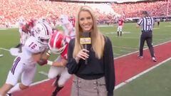 Sideline reporter takes hit in American football match