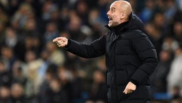 Manchester City&#039;s Spanish manager Pep Guardiola shouts instructions to his players from the touchline during the UEFA Champions League round of 16 second leg football match between Manchester City and Sporting Lisbon at the Etihad Stadium in Manchest
