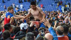 BARCELONA, SPAIN - MAY 18: Wu Lei of RCD Espanyol leaves the pitch on fans&#039; shoulders at the end of the La Liga match between RCD Espanyol and Real Sociedad at RCDE Stadium on May 18, 2019 in Barcelona, Spain. (Photo by Alex Caparros/Getty Images)
