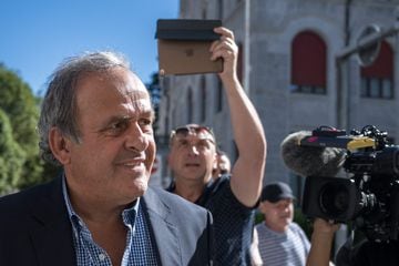 Former UEFA president Michel Platini arrives at Switzerland's Federal Criminal Court to listen to the verdict of his trial over a suspected fraudulent payment. (Photo by Fabrice COFFRINI / AFP)