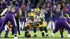 BALTIMORE, MARYLAND - DECEMBER 19: Quarterback Aaron Rodgers #12 waits to take the snap from center Lucas Patrick #62 of the Green Bay Packers in the second half against the Baltimore Ravens at M&amp;T Bank Stadium on December 19, 2021 in Baltimore, Maryl