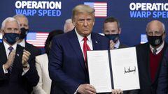 WASHINGTON, DC - DECEMBER 08: US President Donald Trump signed an executive at the Operation Warp Speed Vaccine Summit on December 08, 2020 in Washington, DC. The president signed an executive order stating the US would provide vaccines to Americans befor