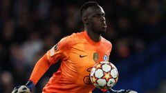 Chelsea&#039;s French-born Senegalese goalkeeper Edouard Mendy controls the ball during the UEFA Champions League Quarter-final first leg football match between Chelsea and Real Madrid at Stamford Bridge stadium in London, on April 6, 2022. (Photo by Adri