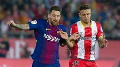 Maffeo disputa el balón con Messi.