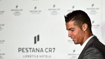 Real Madrid's forward Cristiano Ronaldo arrives onstage to deliver a speech during the official inauguration of the the Pestana CR7 Lisbon Hotel in Lisbon on October 2, 2016.