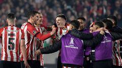 Argentina's Estudiantes de La Plata players celebrate after defeating Brazil's Fortaleza during the Copa Libertadores football tournament round of sixteen second leg match at the Jorge Luis Hirschi stadium in La Plata, Argentina, on July 7, 2022. (Photo by Juan MABROMATA / AFP)