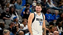 Oct 7, 2022; Dallas, Texas, USA; Dallas Mavericks guard Luka Doncic (77) winks to the team bench during the second quarter against the Orlando Magic at the American Airlines Center. Mandatory Credit: Jerome Miron-USA TODAY Sports