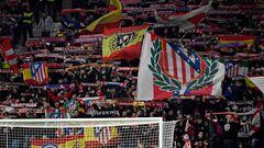 Atletico fans hold their scarves during the Spanish league football match between Club Atletico de Madrid and Deportivo Alaves at the Metropolitano stadium in Madrid on October 29, 2023. (Photo by JAVIER SORIANO / AFP)