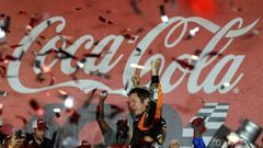 CHARLOTTE, NC - MAY 29: Martin Truex Jr., driver of the #78 Bass Pro Shops/Tracker Toyota, celebrates with champagne in Victory Lane after winning the NASCAR Sprint Cup Series Coca-Cola 600 at Charlotte Motor Speedway on May 29, 2016 in Charlotte, North C