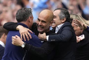 Guardiola celebrates winning the Premier League, after the 3-2 win over Aston Villa.
