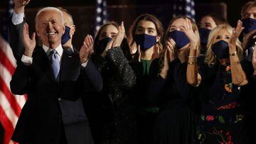 FILE PHOTO: Democratic 2020 U.S. presidential nominee Joe Biden and his family celebrate onstage at his election rally, after the news media announced that Biden has won the 2020 U.S. presidential election over President Donald Trump, in Wilmington, Delaw