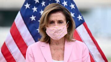 U.S. House Speaker Nancy Pelosi wears a protective mask at a bill enrollment ceremony for the Great American Outdoors Act, in Washington.