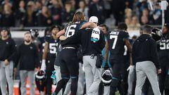 JACKSONVILLE, FLORIDA - DECEMBER 04: Trevor Lawrence #16 of the Jacksonville Jaguars is helped off the field by trainers after being injured against the Cincinnati Bengals during the fourth quarter at EverBank Stadium on December 04, 2023 in Jacksonville, Florida.   Courtney Culbreath/Getty Images/AFP (Photo by Courtney Culbreath / GETTY IMAGES NORTH AMERICA / Getty Images via AFP)