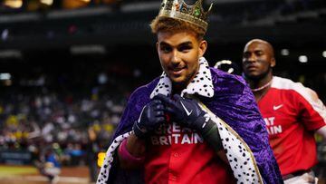 PHOENIX, AZ - MARCH 13:  Harry Ford #1 of Team Great Britain is is given a crown and robe after hitting a solo home run in the sixth inning during Game 5 of Pool C between Team Colombia and Team Great Britain at Chase Field on Monday, March 13, 2023 in Phoenix, Arizona. (Photo by Daniel Shirey/WBCI/MLB Photos via Getty Images)