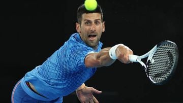 MELBOURNE, AUSTRALIA - JANUARY 29: Novak Djokovic of Serbia plays a backhand in the Men’s Singles Final against Stefanos Tsitsipas of Greece during day 14 of the 2023 Australian Open at Melbourne Park on January 29, 2023 in Melbourne, Australia. (Photo by Clive Brunskill/Getty Images)