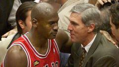 SLC18D:SPORT-NBA:SALT LAKE CITY,15JUN98 - Chicago Bulls Michael Jordan is congratulated by Utah Jazz coach Jerry Sloan after the Bulls defeated the Jazz 87-86 to win the NBA championship June 14th. Jordan sunk the game-winning basket and was named the ser