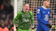 Everton's English goalkeeper Jordan Pickford (L) celebrates behind Chelsea's German midfielder Kai Havertz at the end of the English Premier League football match between Chelsea and Everton at Stamford Bridge in London on March 18, 2023. - Chelsea and Everton equalised 2 - 2. (Photo by Glyn KIRK / AFP) / RESTRICTED TO EDITORIAL USE. No use with unauthorized audio, video, data, fixture lists, club/league logos or 'live' services. Online in-match use limited to 120 images. An additional 40 images may be used in extra time. No video emulation. Social media in-match use limited to 120 images. An additional 40 images may be used in extra time. No use in betting publications, games or single club/league/player publications. / 