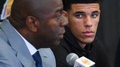 LOS ANGELES, CA - JUNE 23: Lonzo Ball looks on as Magic Johnson, president of basketball operations of the Los Angeles Lakers talks to the media during a press conference on June 23, 2017 at the team training faculity in Los Angeles, California.   Jayne Kamin-Oncea/Getty Images/AFP == FOR NEWSPAPERS, INTERNET, TELCOS &amp; TELEVISION USE ONLY ==