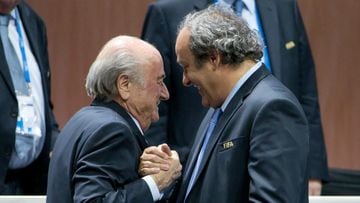 FIFA suing Blatter, Platini to recoup "undue payment"
