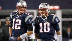 FOXBORO, MA - NOVEMBER 13: Tom Brady #12 and Jimmy Garoppolo #10 of the New England Patriots warm up before a game against the Seattle Seahawks at Gillette Stadium on November 13, 2016 in Foxboro, Massachusetts.  (Photo by Jim Rogash/Getty Images)
