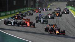 Red Bull&#039;s Dutch driver Max Verstappen (R) leads the pack followed by Ferrari&#039;s German driver Sebastian Vettel (C) and Mercedes&#039; British driver Lewis Hamilton (L) during the F1 Brazil Grand Prix, at the Interlagos racetrack in Sao Paulo, Br