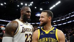 LeBron James #23 of the Los Angeles Lakers and Stephen Curry #30 of the Golden State Warriors talk to each other after the Lakers beat the Warriors in double overtime at Chase Center on January 27, 2024 in San Francisco, California.