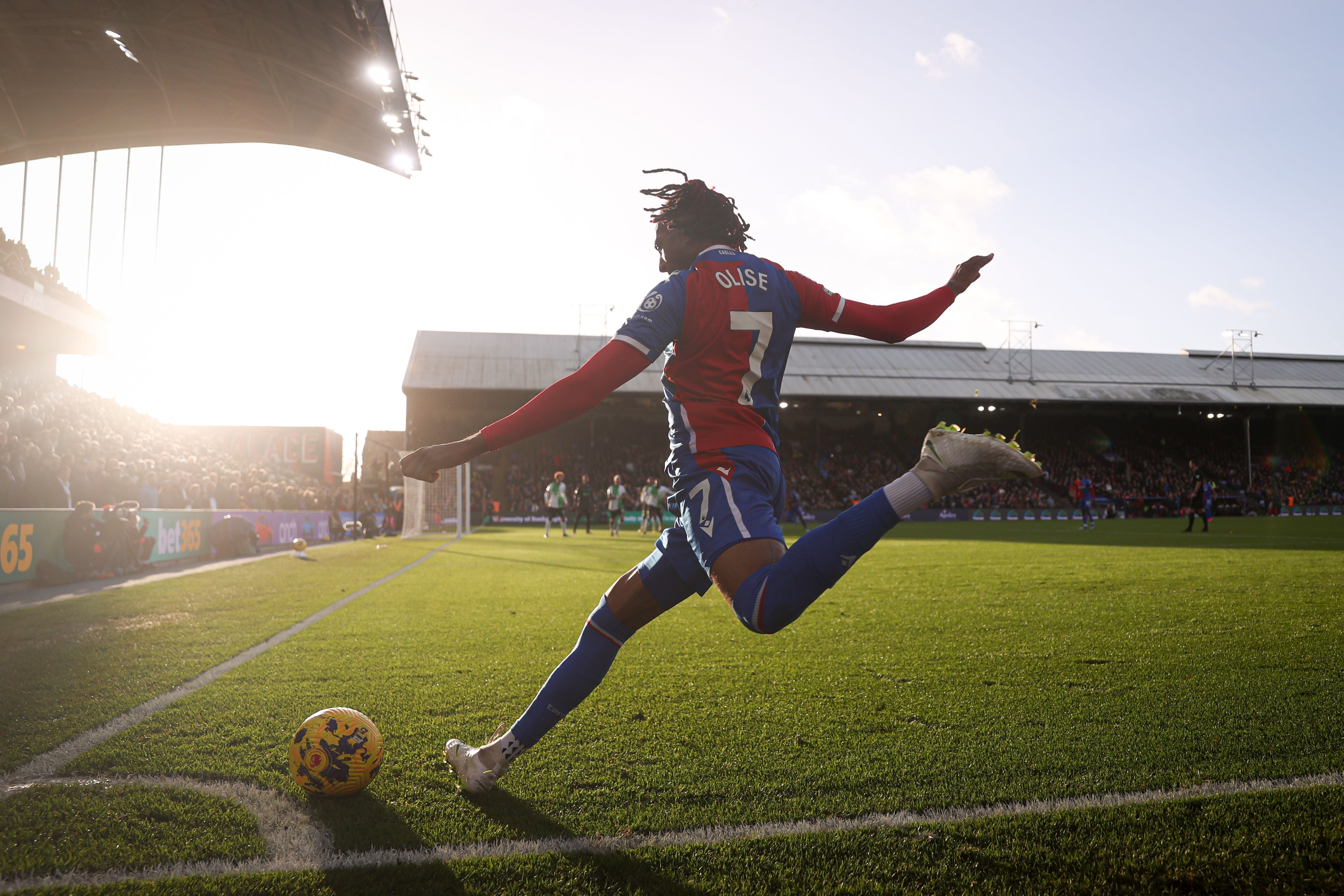 LONDON, ENGLAND - DECEMBER 09: Michael Olise of Crystal Palace takes a corner kick during the Premier League match between Crystal Palace and Liverpool FC at Selhurst Park on December 09, 2023 in London, England. (Photo by Alex Pantling/Getty Images)