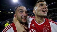 Hakim Ziyech of Ajax celebrates 1-1 with Dusan Tadic of Ajax  during the UEFA Champions League  match between Ajax v Real Madrid