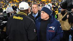 PITTSBURGH, PENNSYLVANIA - DECEMBER 07: New England Patriots head coach Bill Belichick and Pittsburgh Steelers head coach Mike Tomlin speak after the game at Acrisure Stadium on December 07, 2023 in Pittsburgh, Pennsylvania.   Joe Sargent/Getty Images/AFP (Photo by Joe Sargent / GETTY IMAGES NORTH AMERICA / Getty Images via AFP)