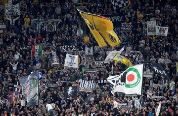Juventus fans celebrate at the end of the match