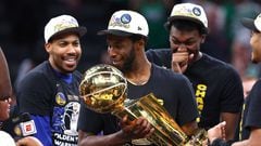 BOSTON, MASSACHUSETTS - JUNE 16: Andrew Wiggins #22 of the Golden State Warriors celebrates with th Larry O'Brien Championship Trophy after defeating the Boston Celtics 103-90 in Game Six of the 2022 NBA Finals at TD Garden on June 16, 2022 in Boston, Massachusetts. NOTE TO USER: User expressly acknowledges and agrees that, by downloading and/or using this photograph, User is consenting to the terms and conditions of the Getty Images License Agreement.   Elsa/Getty Images/AFP
== FOR NEWSPAPERS, INTERNET, TELCOS & TELEVISION USE ONLY ==