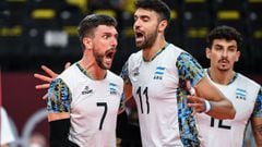 (L-R) Argentina&#039;s Facundo Conte and Sebastian Sole react after a point in the men&#039;s semi-final volleyball match between France and Argentina during the Tokyo 2020 Olympic Games at Ariake Arena in Tokyo on August 5, 2021. (Photo by Yuri Cortez / AFP)