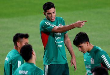 DOHA, QATAR - NOVEMBER 19: Raul Jimenez #9 of Team Mexico speaks during a training session for Team Mexico at Al Khor Stadium on November 19, 2022 in Doha, Qatar.  (Photo by Elsa/Getty Images)