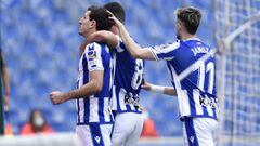 SAN SEBASTIAN, SPAIN - FEBRUARY 07: Mikel Oyarzabal of Real Sociedad celebrates with team mates Mikel Merino and Adnan Januzaj after scoring their side&#039;s first goal from the penalty spot during the La Liga Santander match between Real Sociedad and Ca
