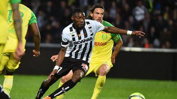 Angers&#039; Cameroonian forward Karl Toko Ekambi (L) vies with Nantes&#039; Slovenian midfielder Rene Krhin (R) during the French L1 football match between Angers (SCO) and Nantes (FC) on May 12, 2018, at Raymond-Kopa Stadium, in Angers, northwestern Fra
