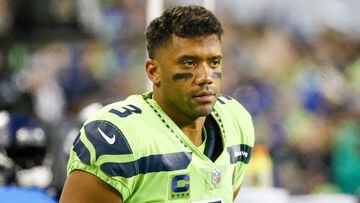 Oct 7, 2021; Seattle, Washington, USA; Seattle Seahawks quarterback Russell Wilson (3) stands on the sideline during the fourth quarter against the Los Angeles Rams at Lumen Field. Mandatory Credit: Joe Nicholson-USA TODAY Sports