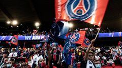 Paris Saint-Germain (PSG) supporters cheer for their team as they watch at the Parc des Princes in Paris, France, on August 23, 2020, the UEFA Champions League final football match between PSG and Bayern Munich played at the Luz stadium in Lisbon. Photo b