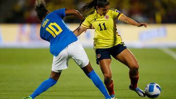 Soccer Football - Women's Copa America - Final - Colombia v Brazil - Estadio Alfonso Lopez, Bucaramanga, Colombia - July 30, 2022 Brazil's Duda in action with Colombia's Catalina Usme REUTERS/Mariana Greif
