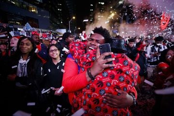TORONTO, ON - JUNE 13: Toronto Raptors fans cheer after the team beat the Golden State Warriors in Game Six of the NBA Finals, during a viewing party in Jurassic Park outside of Scotiabank Arena on June 13, 2019 in Toronto, Canada.  