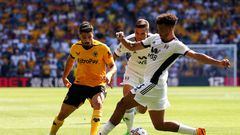 Wolverhampton Wanderers' Pedro Neto (left) and Fulham's Antonee Robinson battle for the ball during the Premier League match at the Molineux Stadium, Wolverhampton. Picture date: Saturday August 13, 2022. (Photo by David Davies/PA Images via Getty Images)
